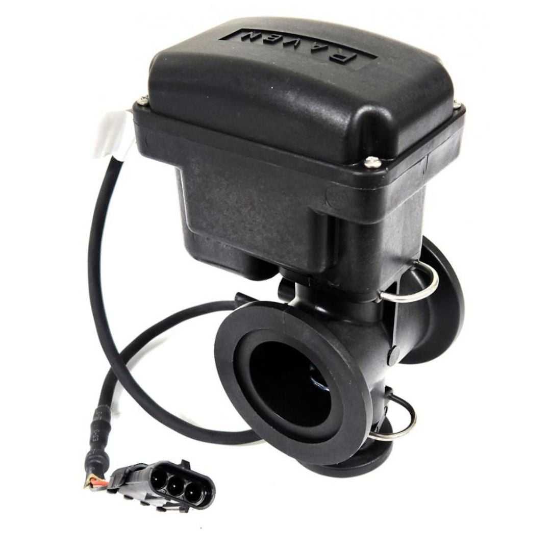 The Raven Boom Valve Single Section Manifold ON/OFF M200 X M100, branded by Raven, is housed in a compact rectangular casing and features a black electronic design. It is equipped with wiring and connectors specifically tailored for precise liquid flow control in agricultural applications. With its dependable 3/4" FPT tubing outlet, this product ensures efficient performance.