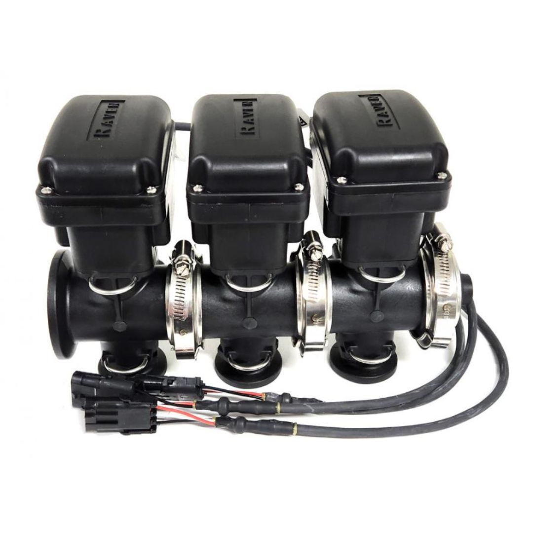 Close-up of a black automotive part, featuring the Raven 3 Section On/Off Manifold Valve by Raven, with three connected throttle bodies, wiring, and metal clamps that emphasize its intricate role in fluid control.