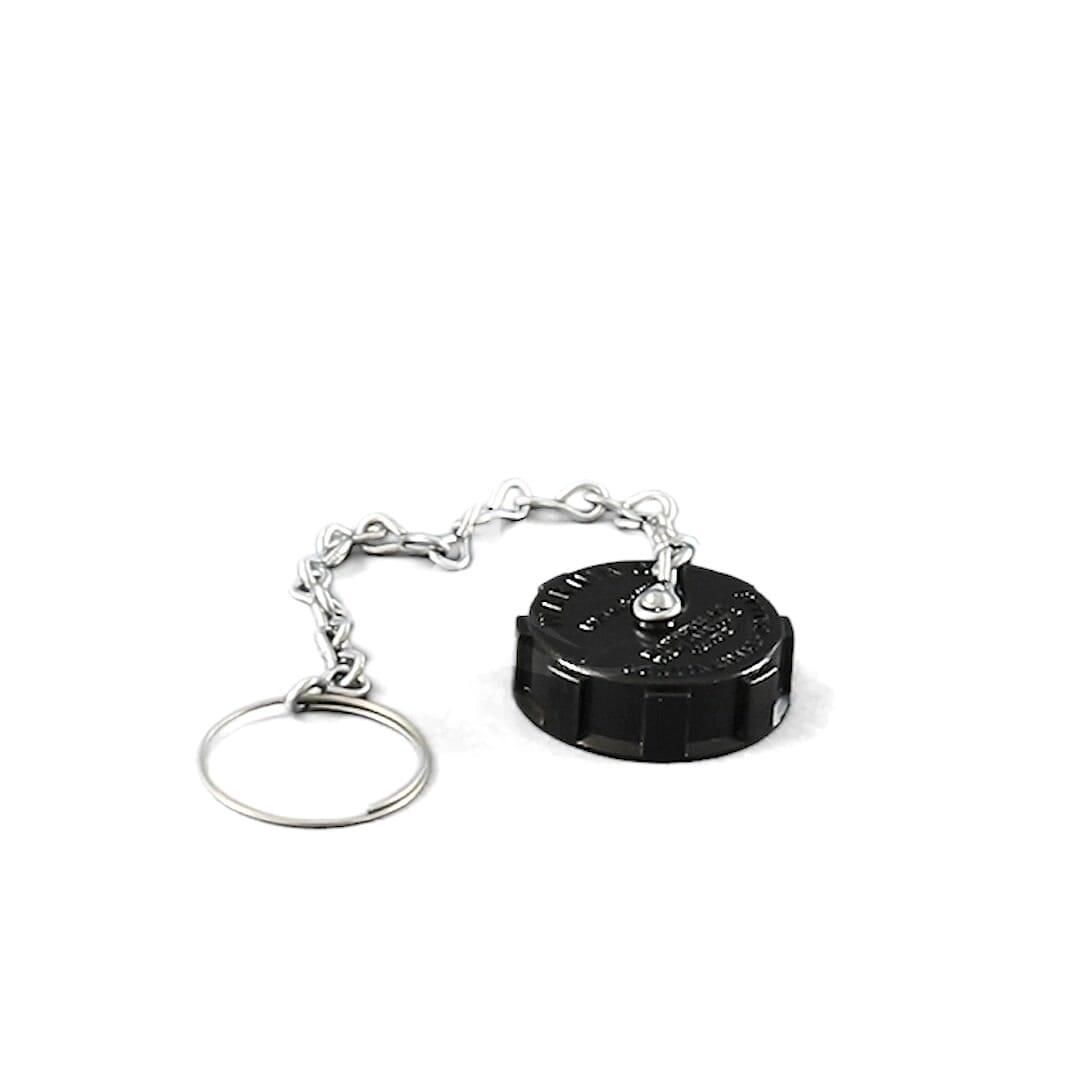 Continental NH3 1-3/4" ACME Replacement Dust Cap with Chain, made of black plastic and featuring a keyring, is perfect for cryogenic applications, shown on a white background.