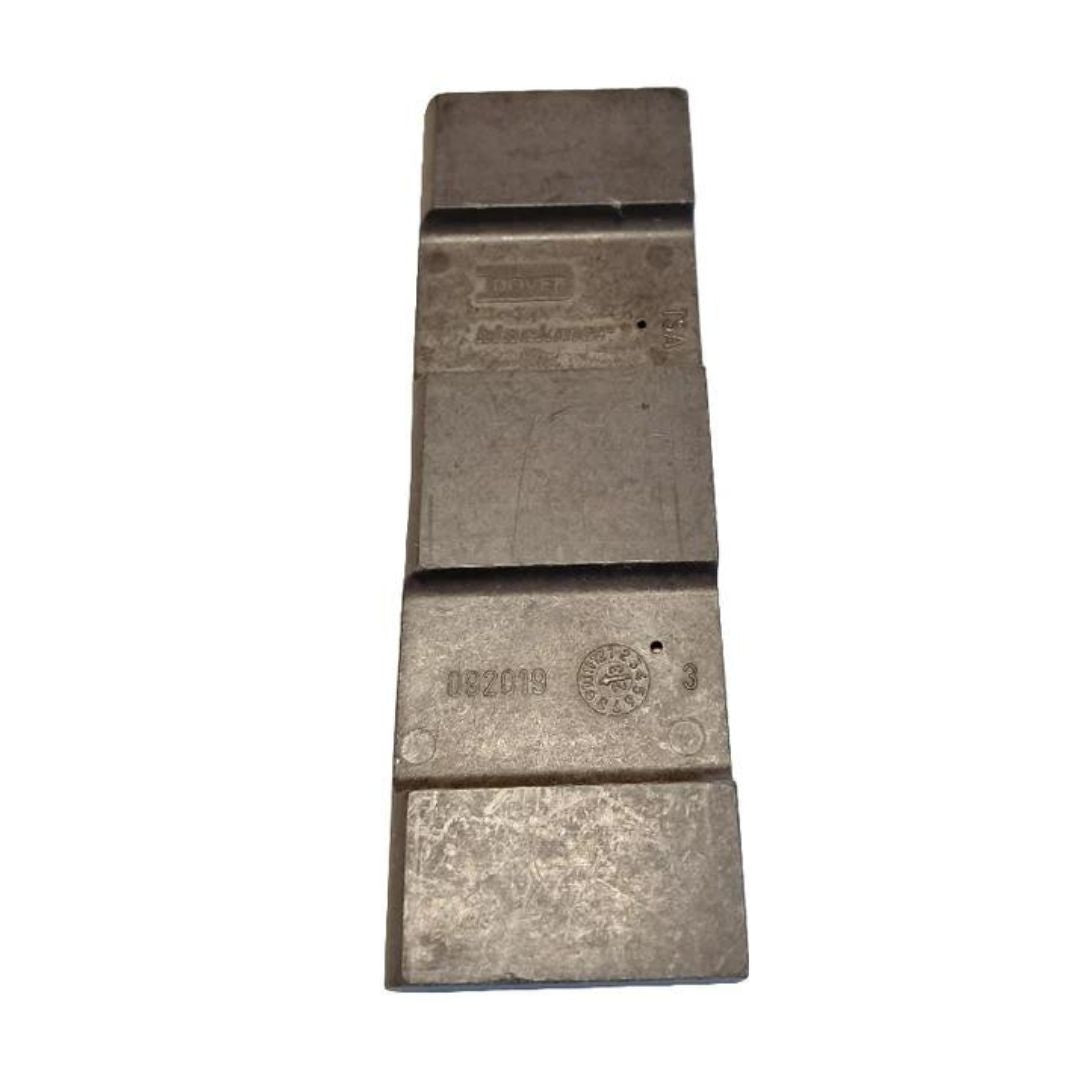 A rectangular metal piece, featuring engraved text and numbers including a date code "082099" along with various markings on a white background, is ideal for use as a Blackmer Vane for the 4" Pump models LGLD4B and TLGLF4B, specifically suited for Duravane replacement in cryogenic applications.