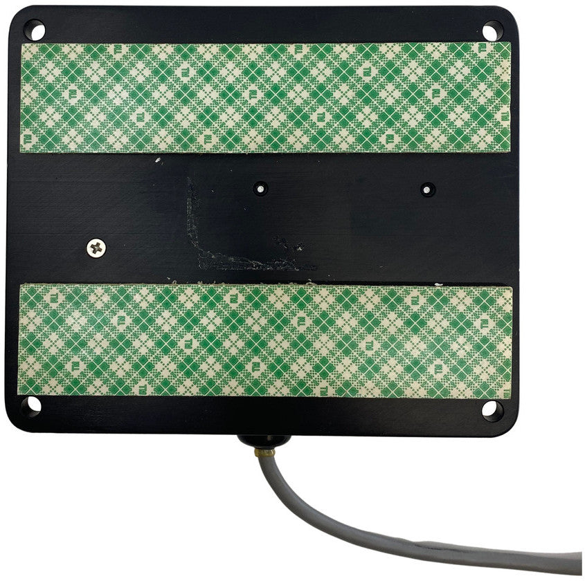 The Raven YAW Sensor - Precision Guidance System (063-0172-684) is a sleek black electronic device from Raven, featuring two green patterned strips and equipped with a cable at the bottom. This innovative tool integrates a Precision YAW Sensor, enhancing its functionality for precise agricultural guidance and ensuring efficient automated steering systems.