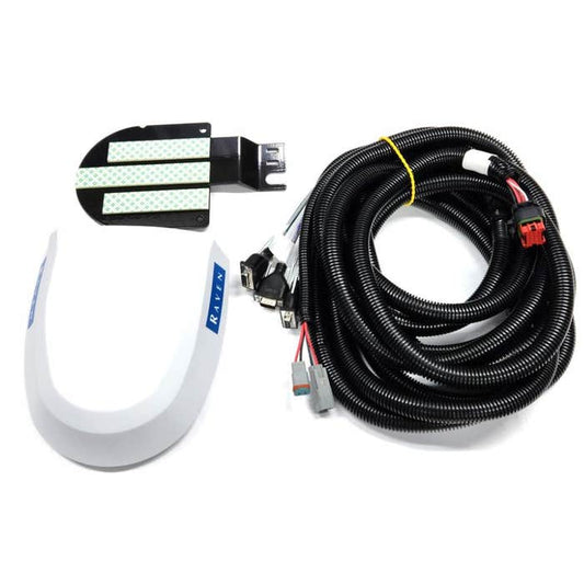A car backup sensor kit featuring a white curved sensor, a black adhesive pad, and a coiled wiring harness with connectors enhances your driving experience. Integrate it seamlessly with the Raven 700S Smart Antenna Kit (117-2000-004) by Raven for precise measurements during precision agriculture tasks.