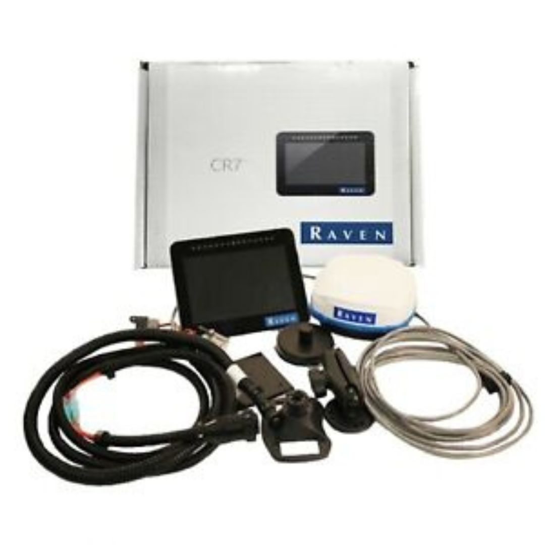 The Raven CR7 Field Computer W/500S Receiver by Raven is a precision agriculture kit that includes a robust field computer with an integrated screen, accompanied by cables and accessories, all neatly displayed in front of the packaging box. As an ISO Universal Terminal, it effectively streamlines your farming operations.