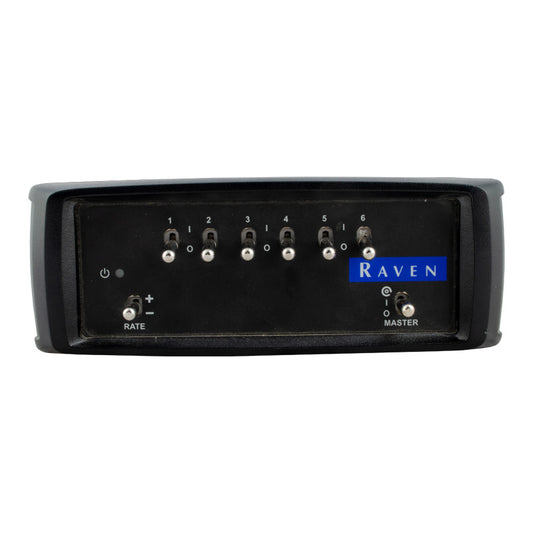 The Raven ISOBUS Switchbox - 6 Section Switches for CR7 (117-2295-051) is a black electronic device featuring six numbered switches, "RATE" and "MASTER" buttons, and the Raven brand label on the right side – perfect for agricultural spraying operations.