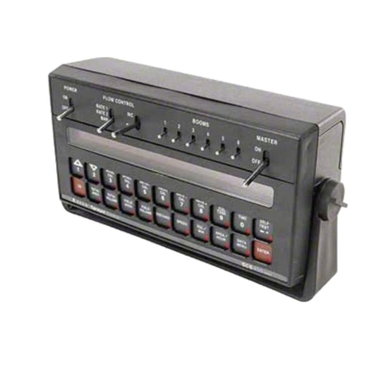 A Raven SCS 450 Spray Control Console - 6 Boom (063-0171-220) featuring a black casing with buttons and switches for volume controls, a microphone input, and ground speed compensation to ensure optimal performance.