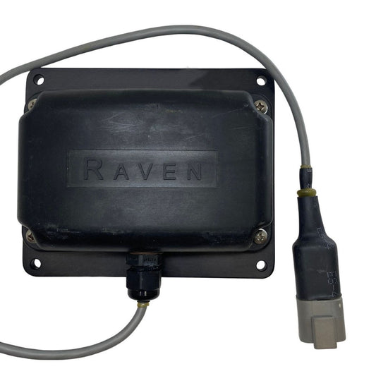 A black electrical device called the "Raven YAW Sensor - Precision Guidance System (063-0172-684)" features attached cables and connectors, designed to integrate seamlessly with automated steering systems for agricultural guidance.