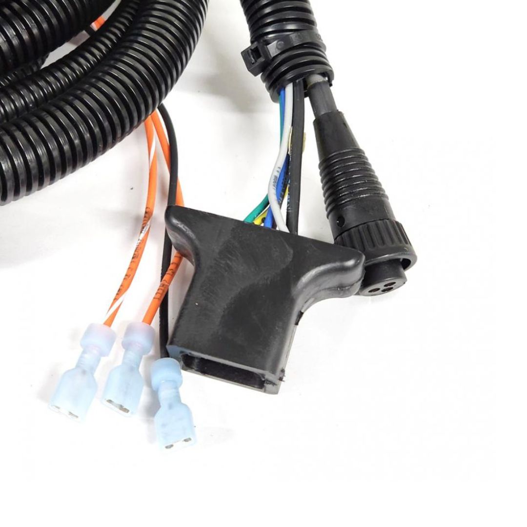 Close-up of a Raven 10' Console Cable - SCS 440 Older Style (115-0159-418) electrical wire harness, featuring multiple connectors and wires, including an older style square plug and blue insulated terminals, ideal for use with a Raven SCS 440 Console.
