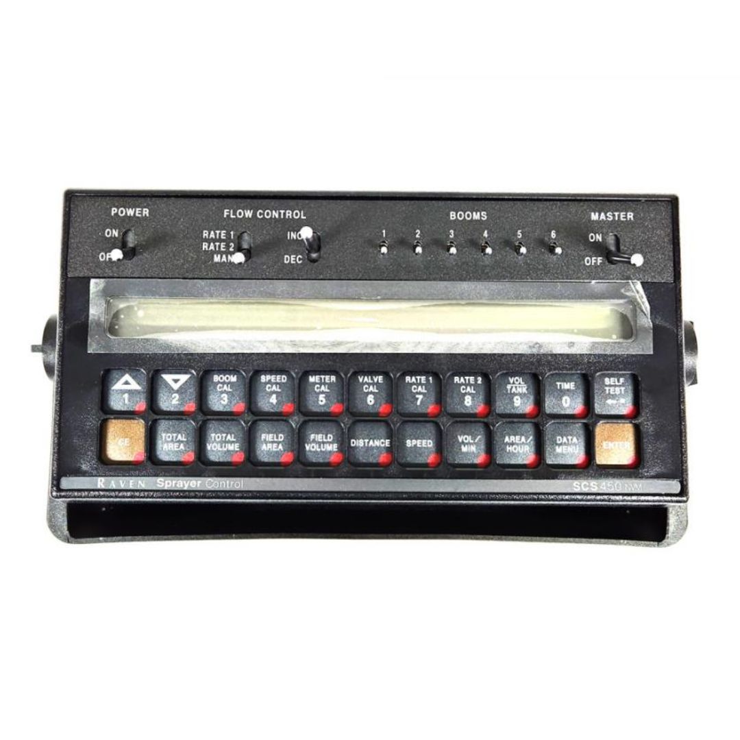 Raven SCS 450 Controller featuring a black control panel equipped with multiple buttons, switches, and a compact display screen for managing liquid or NH3 flow.