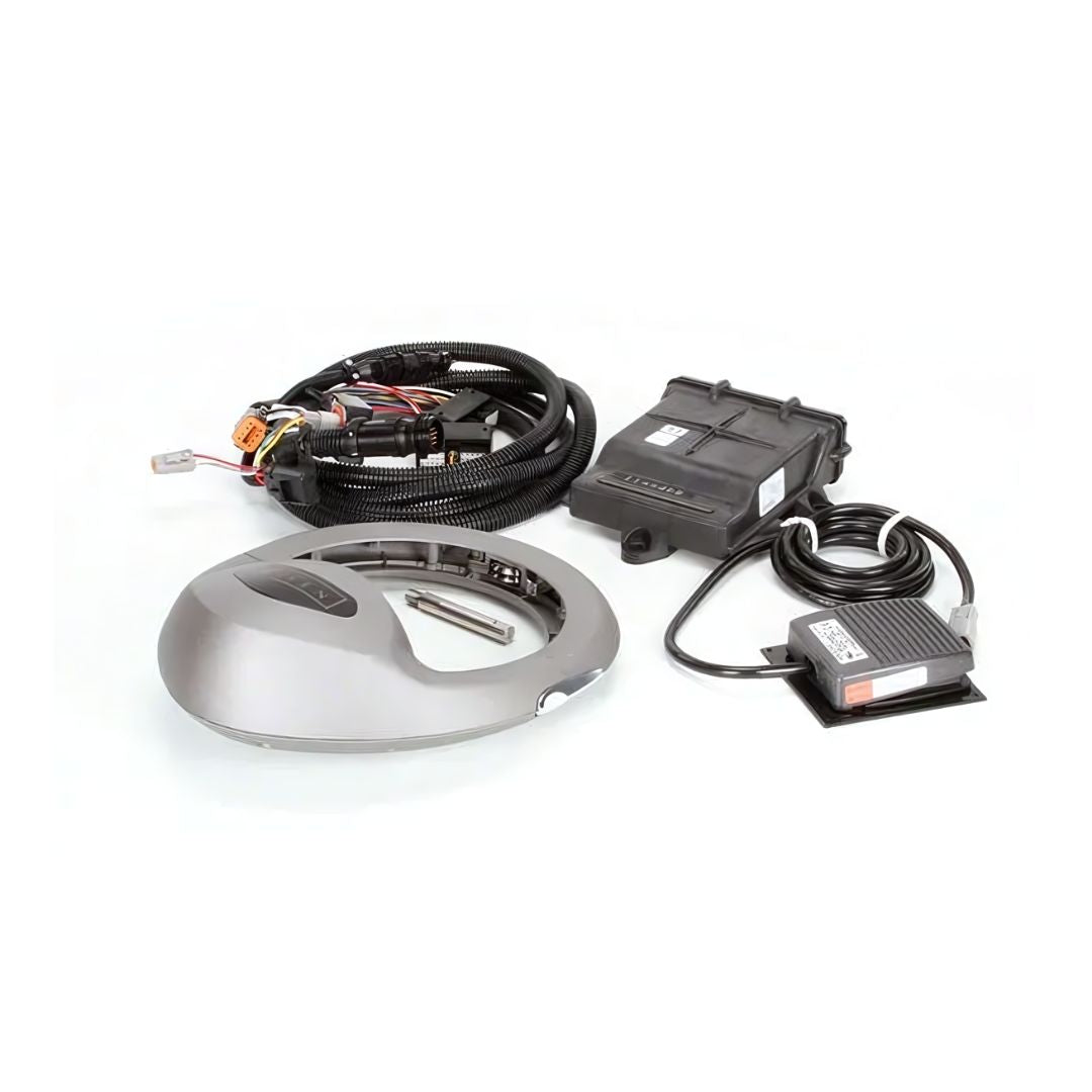 Raven SmarTrax MD Auto Steering System (117-5030-020) by Raven, featuring an automotive wiring harness with connectors, an electronic control unit, a pedal controller for precision steering, and a circular metallic component on a white background.