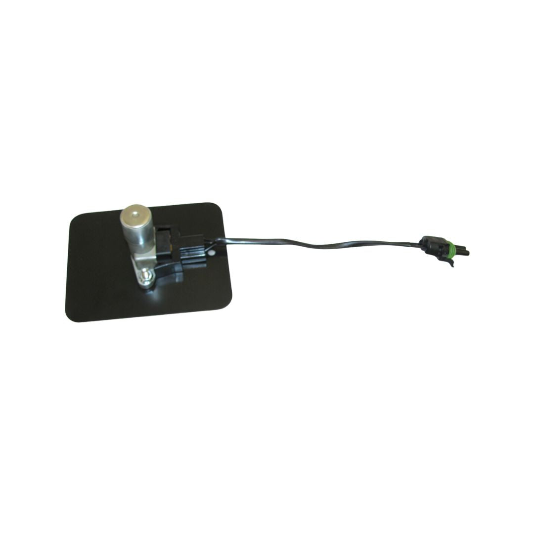 The Outback Run/Hold Foot Switch, featuring a connected cable and a cylindrical component on top, is designed for precision farming applications. Its sleek black square design ensures reliable, hands-free operation, making it an essential tool in agricultural settings. It is isolated against a white background.