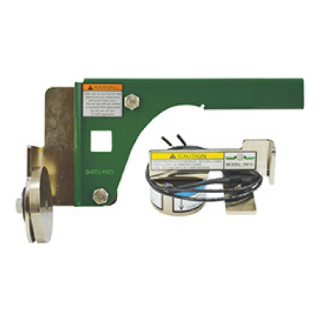 A green metal mounting bracket with attached hardware, including a circular component and wires, designed for use with Fisher Electric Actuators - 12 VDC, 0.6 Amps (P810), fitting N550/N551 models. Safety caution labels are visible.