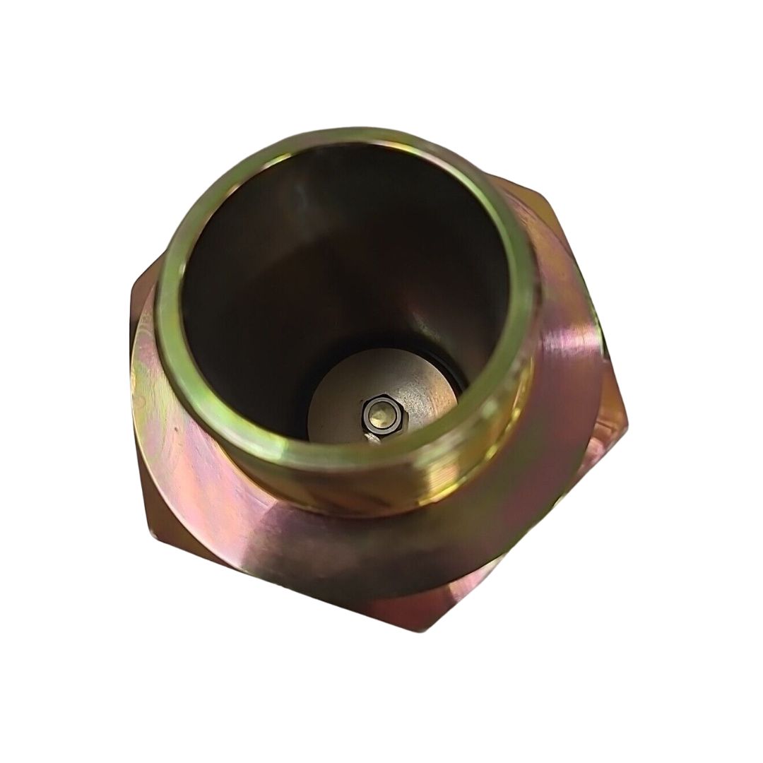 Top view of the Fisher Back Check Valve, featuring a hexagonal design with a smooth, cylindrical interior and a shiny, reflective surface. This metal adapter coupling is suitable for LP-Gas and Anhydrous Ammonia liquid transfer lines and comes in 3" FNPT x 2" MNPT steel.