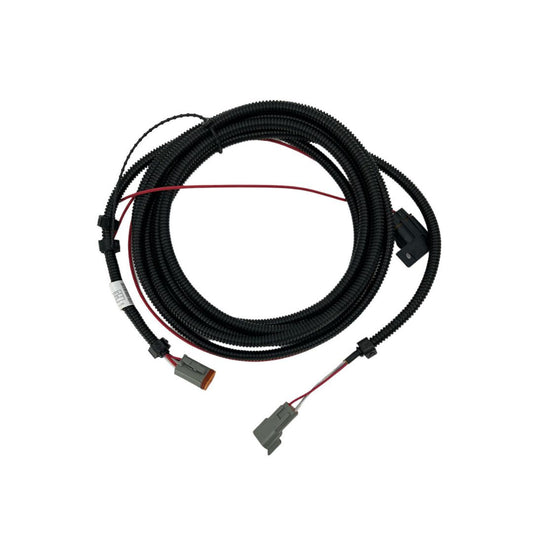 The Raven Cable Adapter - SPS to Yaw Sensor (115-0171-779) is a coiled, black automotive wiring harness with connectors on both ends, featuring red and black wires extending from it. It is designed for integration with precision agriculture systems such as SPS and Yaw sensors.